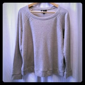 Baku, Silver-Studded Sweatshirt.